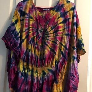 Tie dye  size large and brand new never been worn. Smoke free home. 100% rayon.